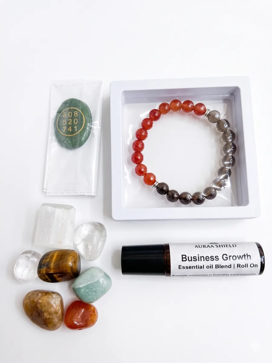 Business Growth remedy kit with bracelet, stones, pouch, and roll-on